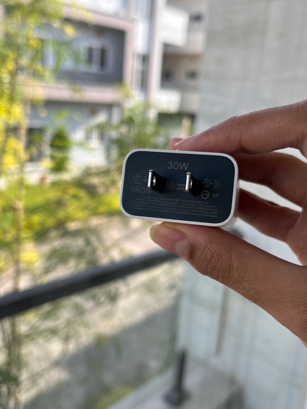 Google Pixel charger plug face showing 30W marking